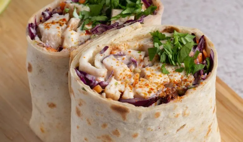 melted cheese packed into a large flour tortilla
